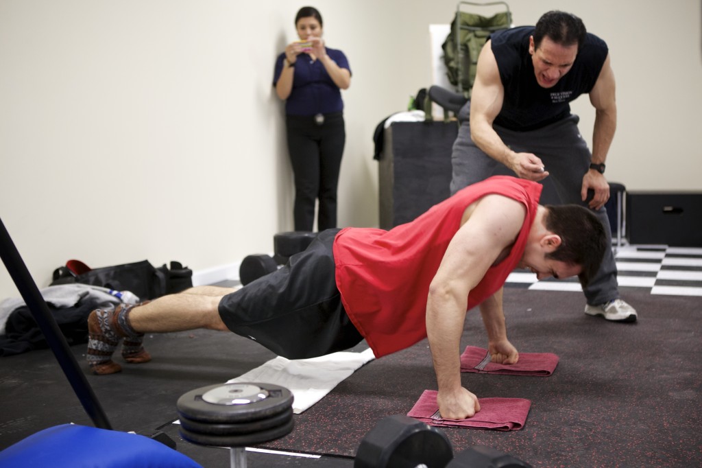 Bobby Natoli breaking the Guinness World Record for Most Knuckle Push-ups in one minute. Old record 45; new record 58.