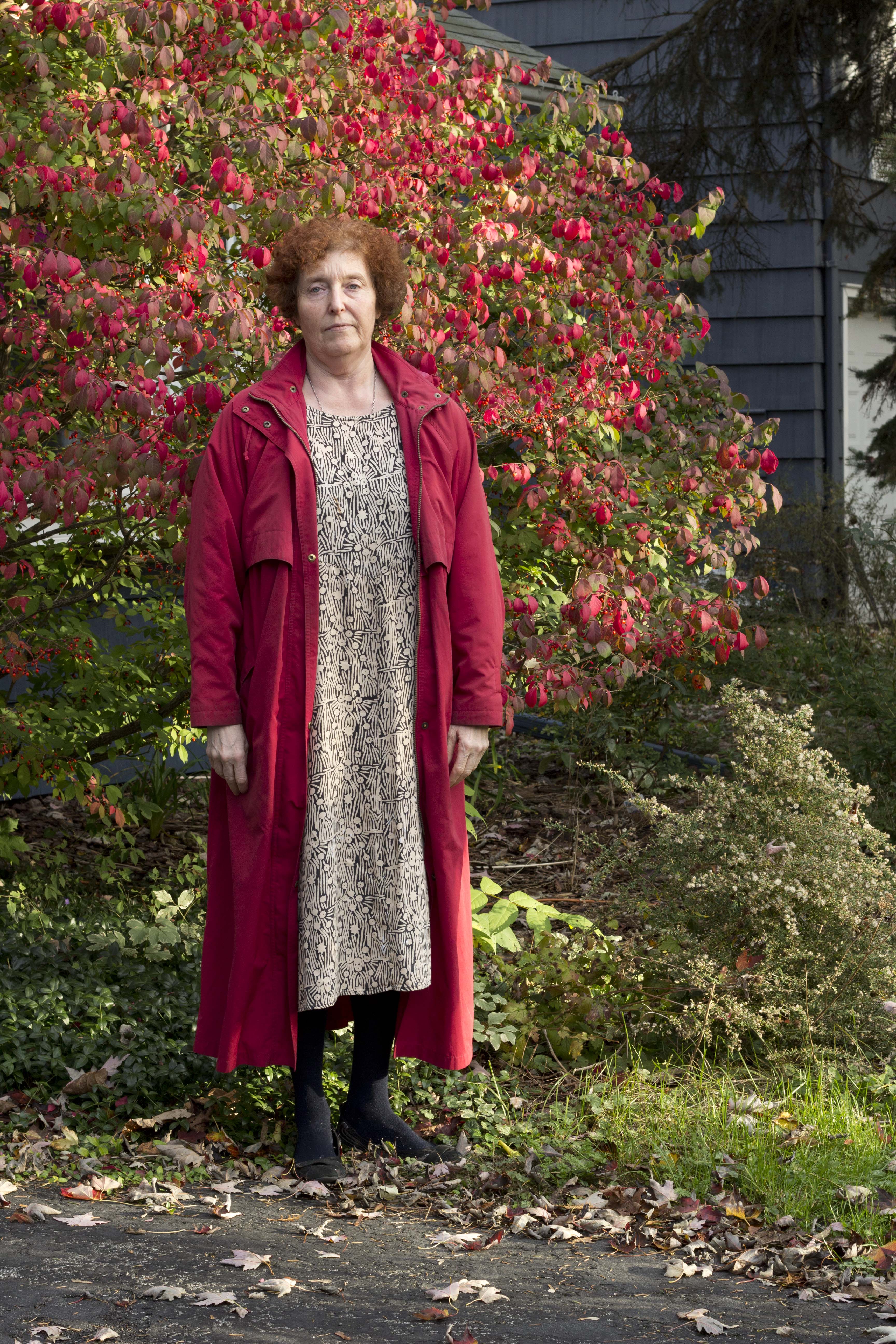 Courtesy of Light Work On display: “Firebush” is a photo by Ana Thor of her mother standing by a large shrub. Thor and Amrita Stuetzle are Nottingham High School graduates who attend Syracuse University and have been recognized for their photography.