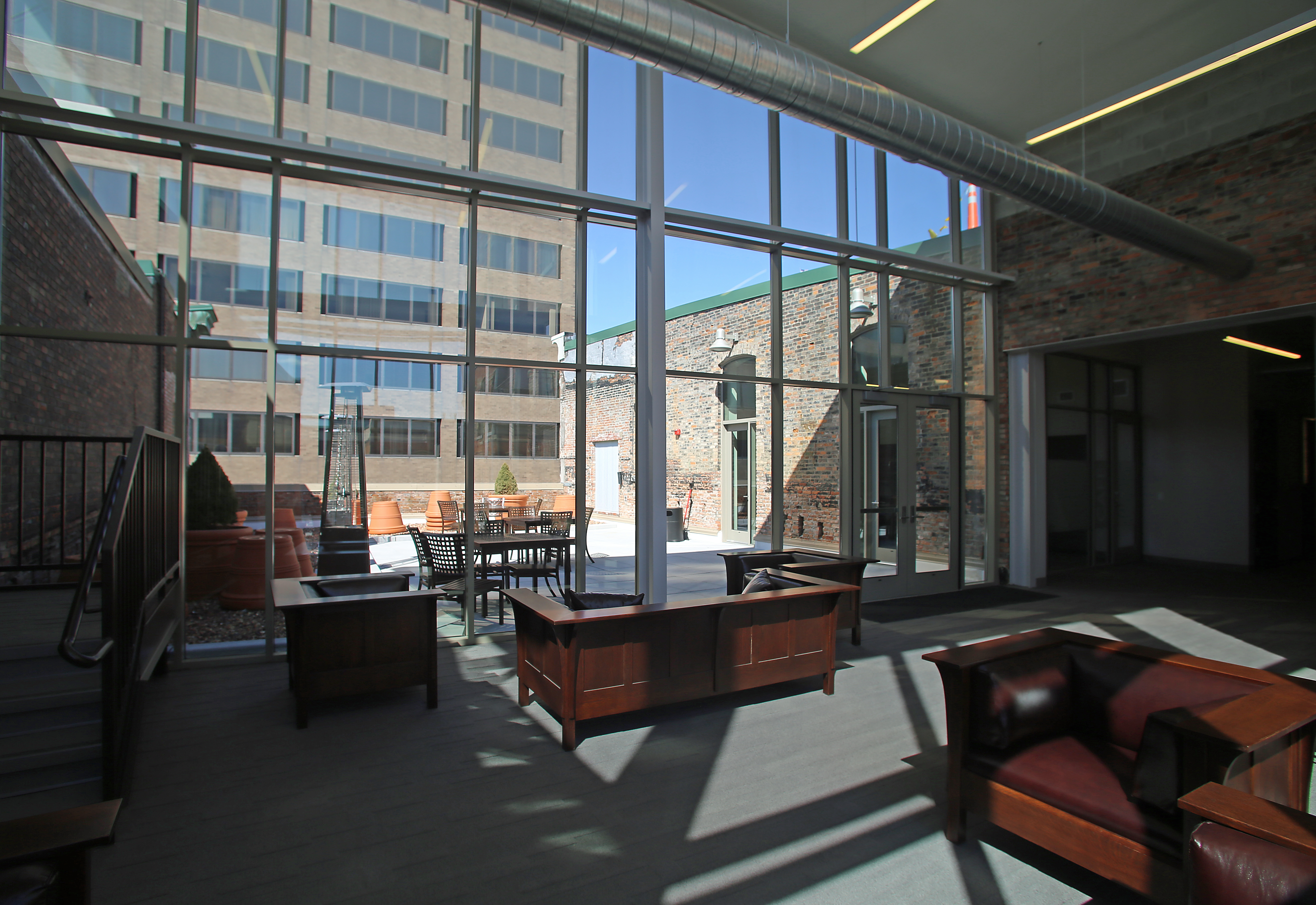 Residents of apartments in the Pike Block share an inside lounge and outdoor patio. (Gloria Wright Photo | Syracuse New Times)