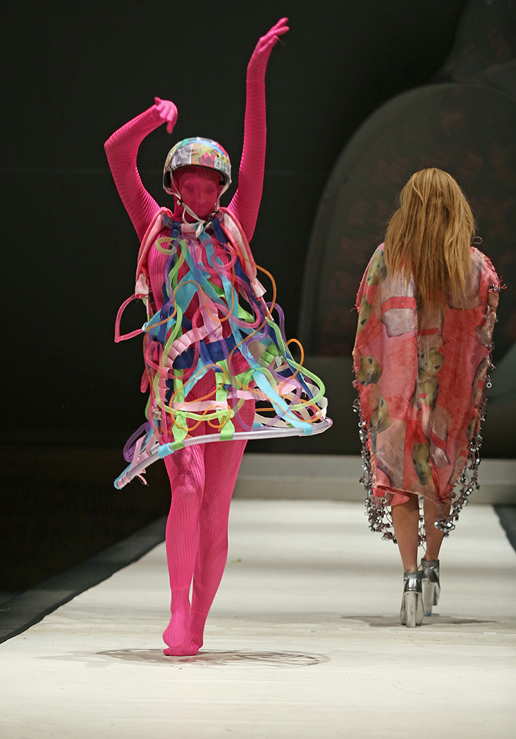 Syracuse University senior Lailee Waxman designed a dress shown at the SU Senior Collection Fashion Show at Goldstein Auditorium. The annual show presents the work of seniors in the College of Visual and Performing Arts fashion design program. Gloria Wright | Syracuse New Times