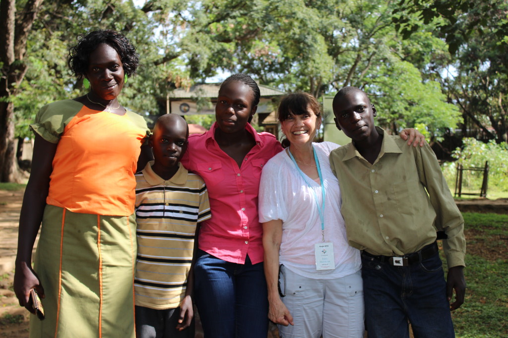 At a park in Kisumi, Kenya, and all dressed up are (from left) the mother, Margaret; a son, Kennedy; the daughter, Christine; the author, Toni Guidice; and a son, Felix. Photo by Toni Guidice