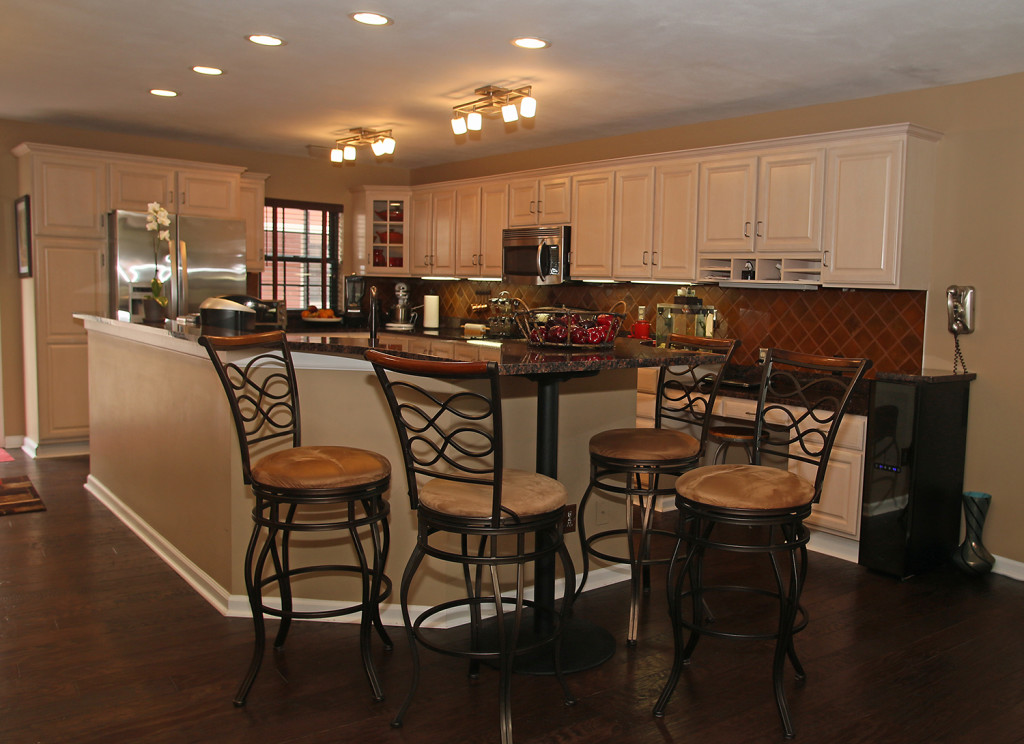 The homeowners of the double unit in Center Armory updated the kitchen with granite counters. Photo by Gloria Wright | Syracuse New Times