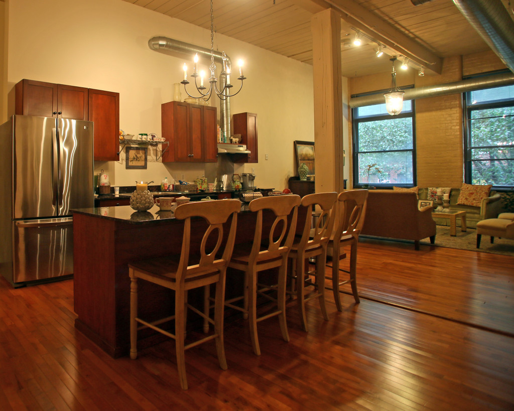 The kitchen in Joyce Gasiorowski's loft in Franklin Square has cherry cabinets. Photo by Gloria Wright | Syracuse New Times