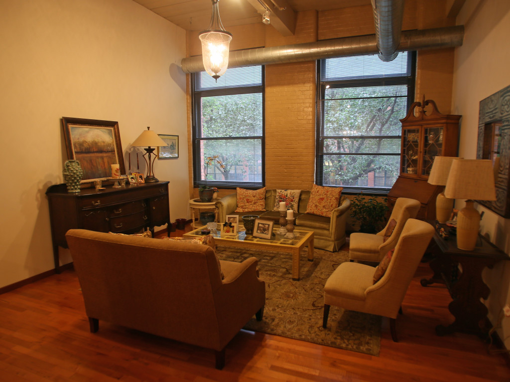 Joyce Gasiorowski has disovered that her family antiques fit into the decor of a downtown loft space. Photo by Gloria Wright | Syracuse New Times