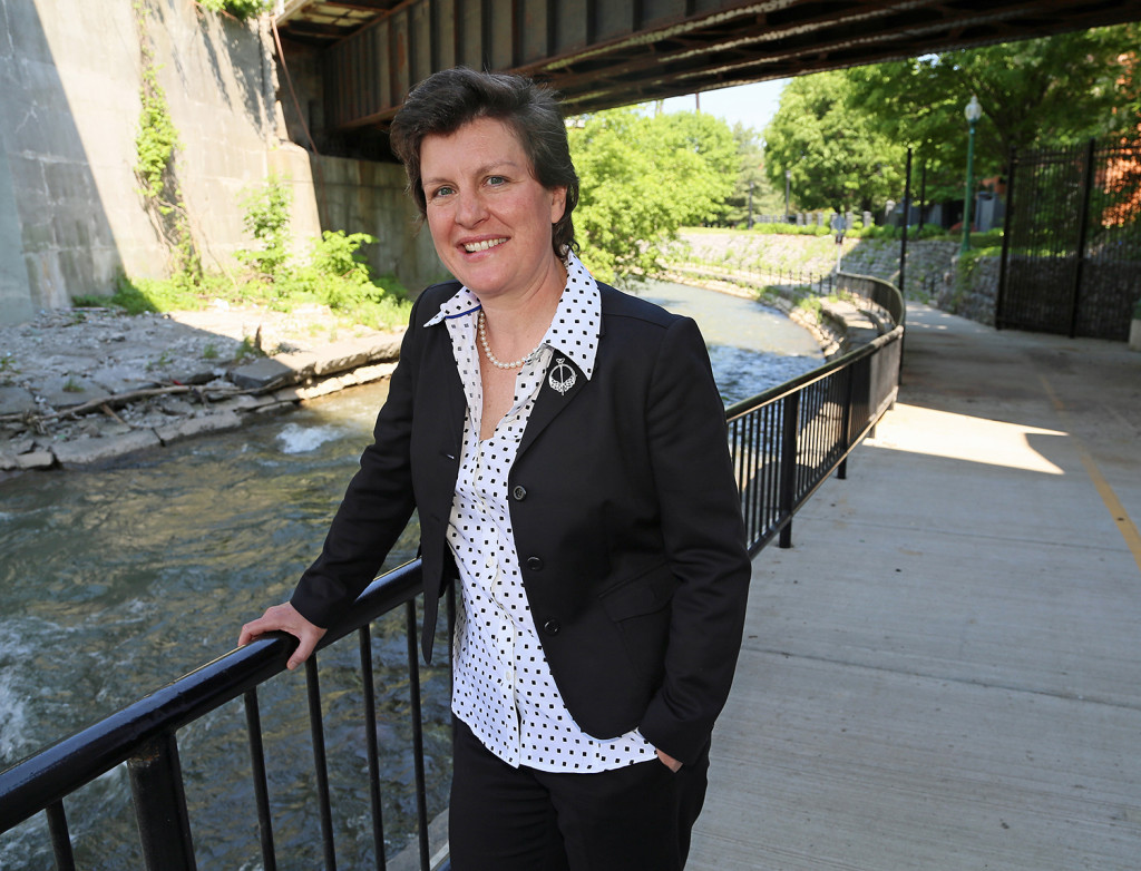 Mayor Miner stands on the Creekwalk. Michael Davis Photo | Syracuse New Times