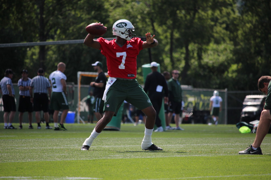 Geno Smith makes a pass in training camp. Photo by David Armelino | Syracuse New Times