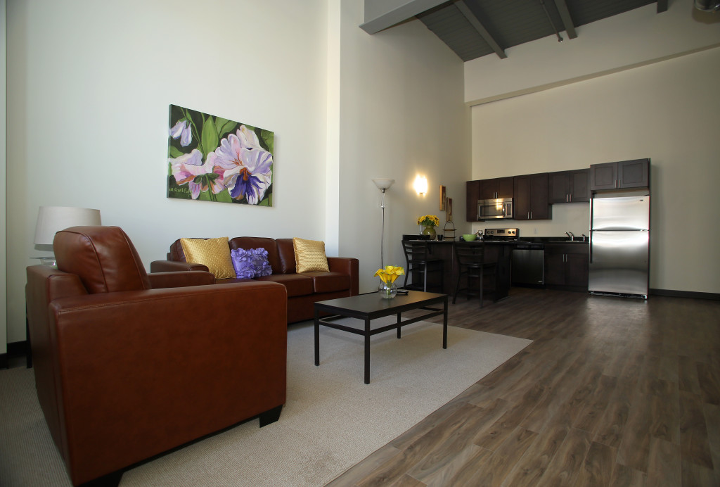 The apartments at Creekwalk Commons are furnished with leather furniture and the kitchens have stainless steel appliances. Photo by Gloria Wright | Syracuse New Times