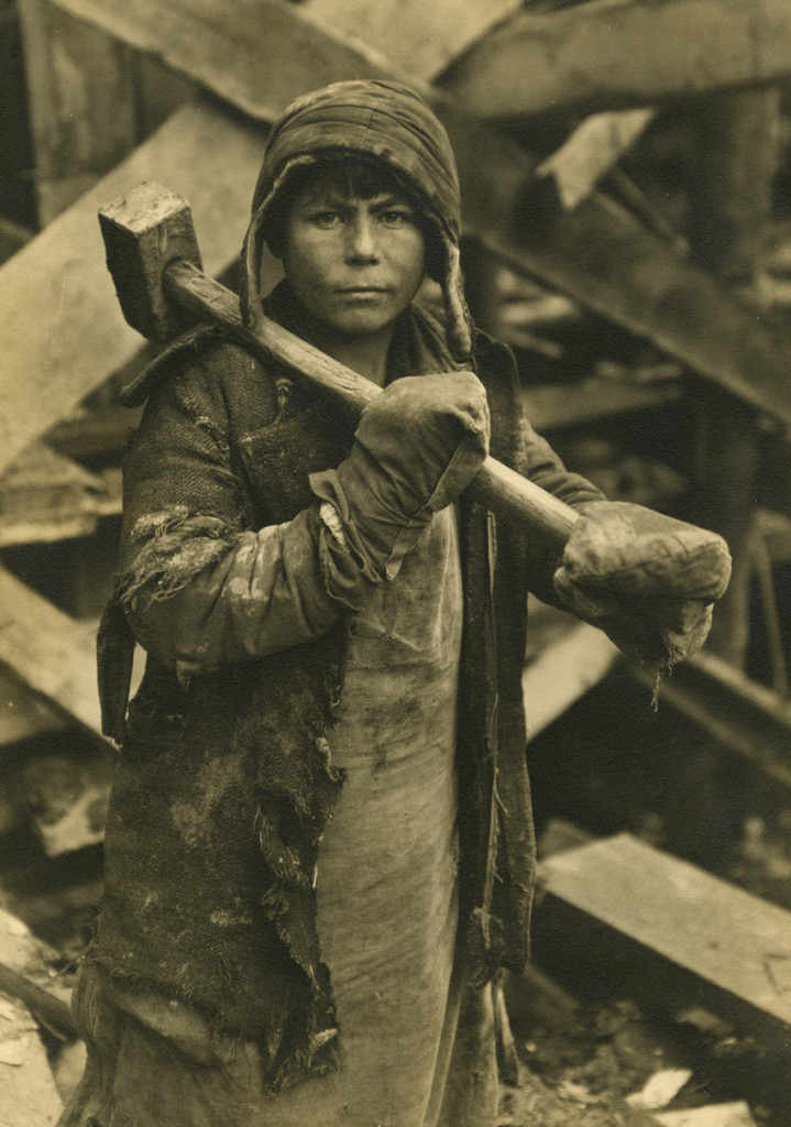 Boy with a hammer. Magnitogorsk, Soviet Union (1931).