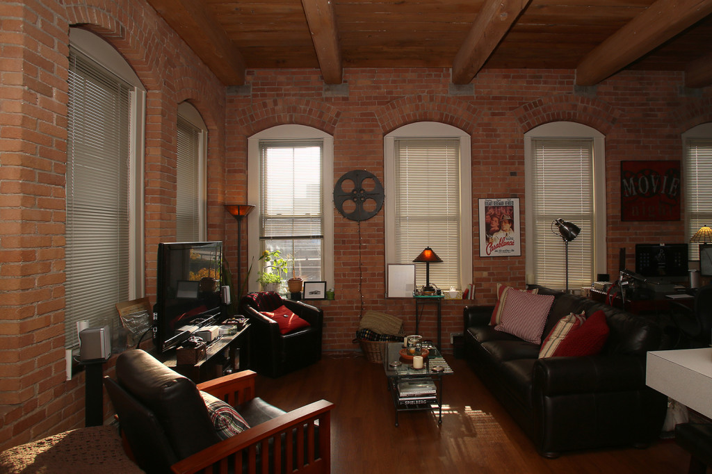 Apartments at Nettleton Commons, a former shoe factory, have exposed brick walls and wood ceilings. Gloria Wright Photo | Syracuse New Times