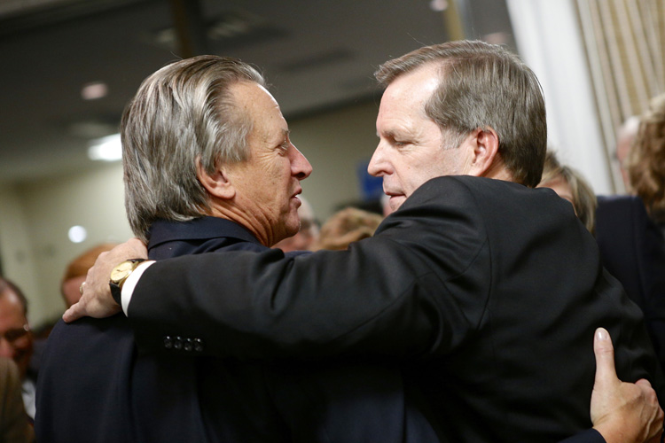 Election 2014 GOP Victory Party - Sheriff elect Conway (right) and faithful friend Michael Davis Photo | Syracuse New Times