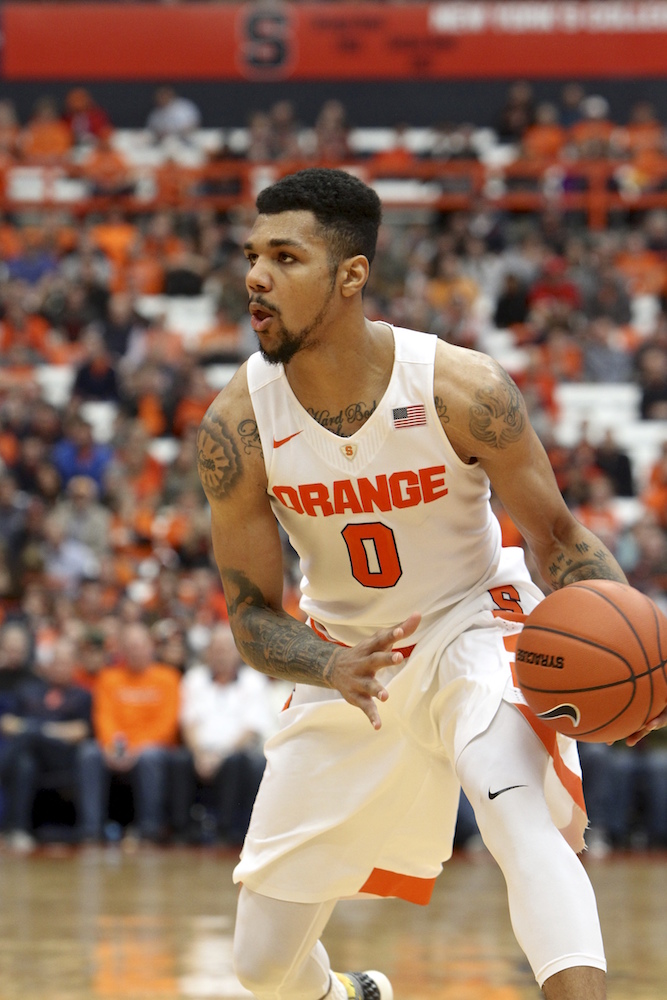 Michael Gbinije playing versus Cornell. Michael Davis photo | Syracuse New Times