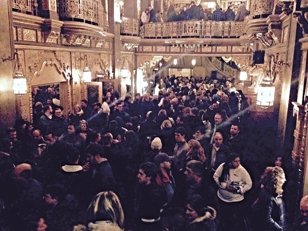 The packed lobby of the Landmark Theatre. Photo by Christopher Malone | Syracuse New Times