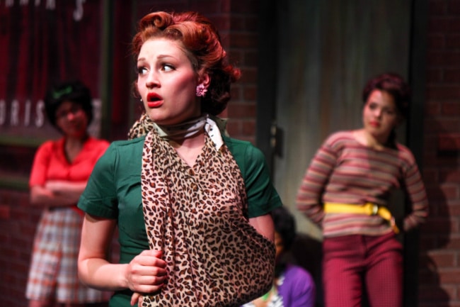 A female actress in an SU 'Little Shop of Horrors' scene.